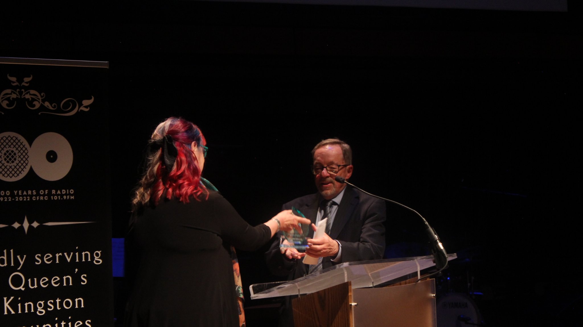 Shelagh Rogers presenting award to David Cunningham