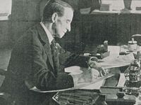 Buchan at his desk