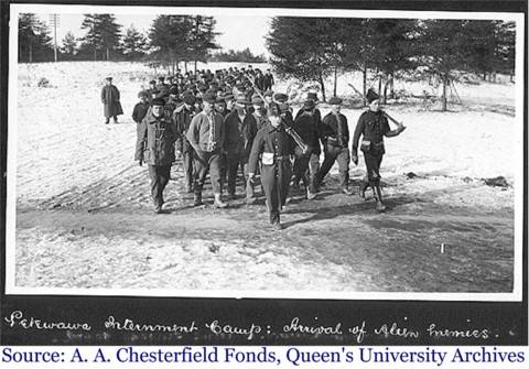 Photograph of "alien enemies" arriving at the Petawawa Internment Camp during WWI.